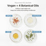 Safflower, sweet almond, jojoba and tea tree leaf oils in petri dishes