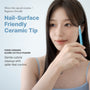 Woman holding the ceramic cuticle pusher near her face