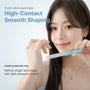 Woman holding the glass nail file near her face